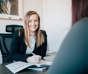 Two women talking at the office